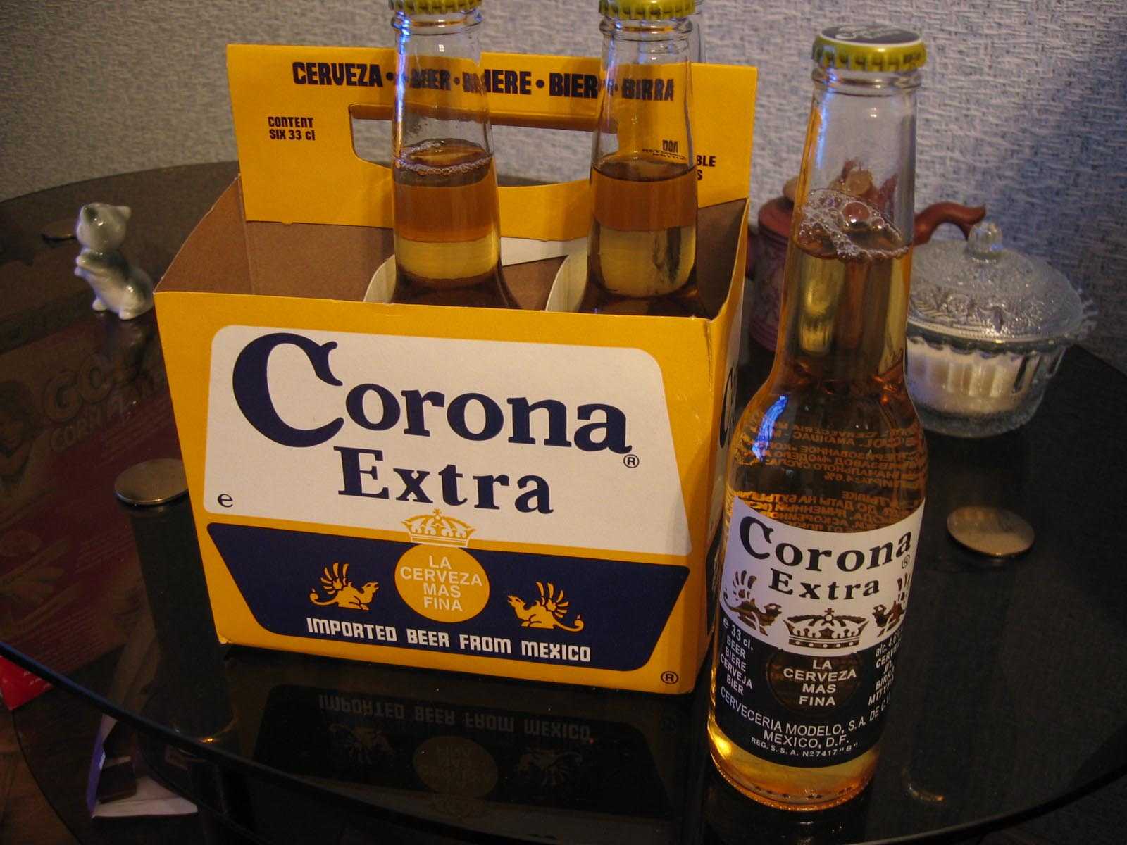 Как пить пиво корона. Пиво Corona Extra (Beer Corona Extra. Пиво Золотая корона Экстра. Корона Экстра упаковка.